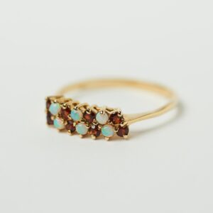 Gold ring with colored stones