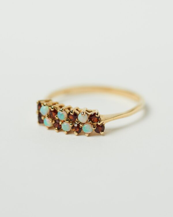 Gold ring with colored stones