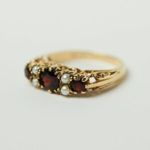 Gold ring with stones